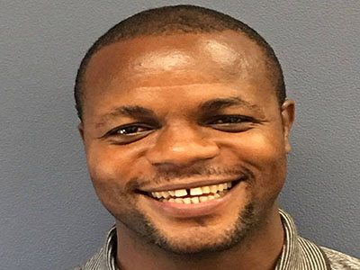 Headshot of Kenny Ajayi
